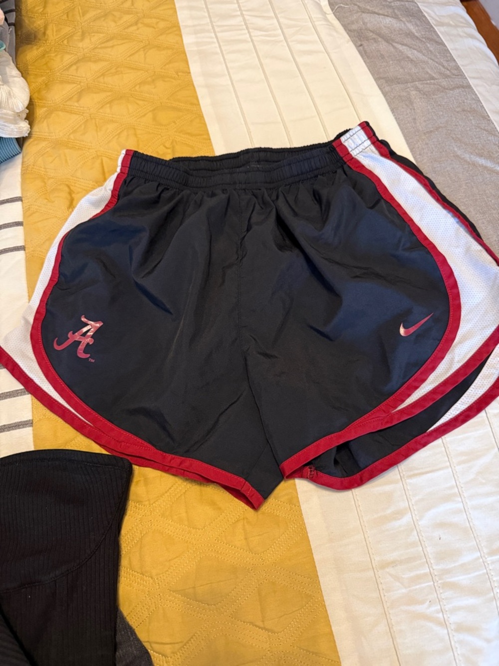 Nike Women's Black Athletic Shorts with Crimson Trim and White Panels